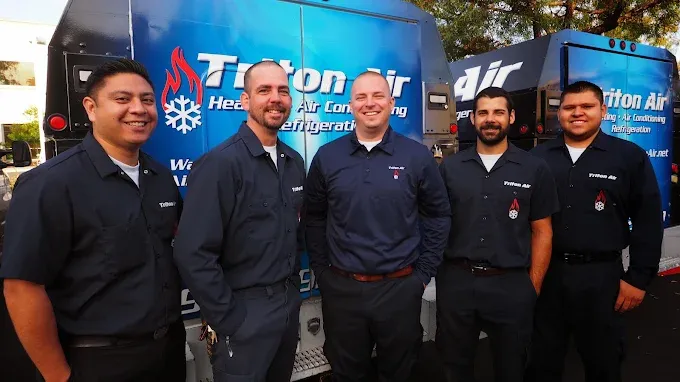 Triton Air & Plumbing technician at a customer’s home